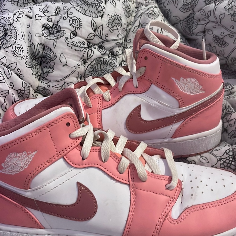 Pink high top air jordans